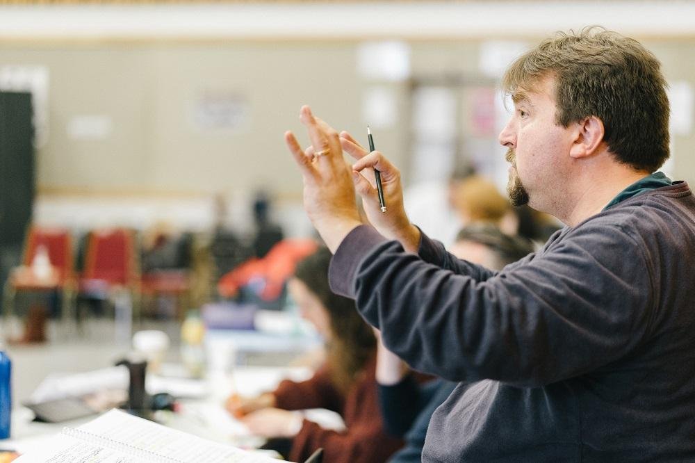 robert_howarth_conducting_the_magic_flute_rehearsals._photo_credit_tom_arber.jpg